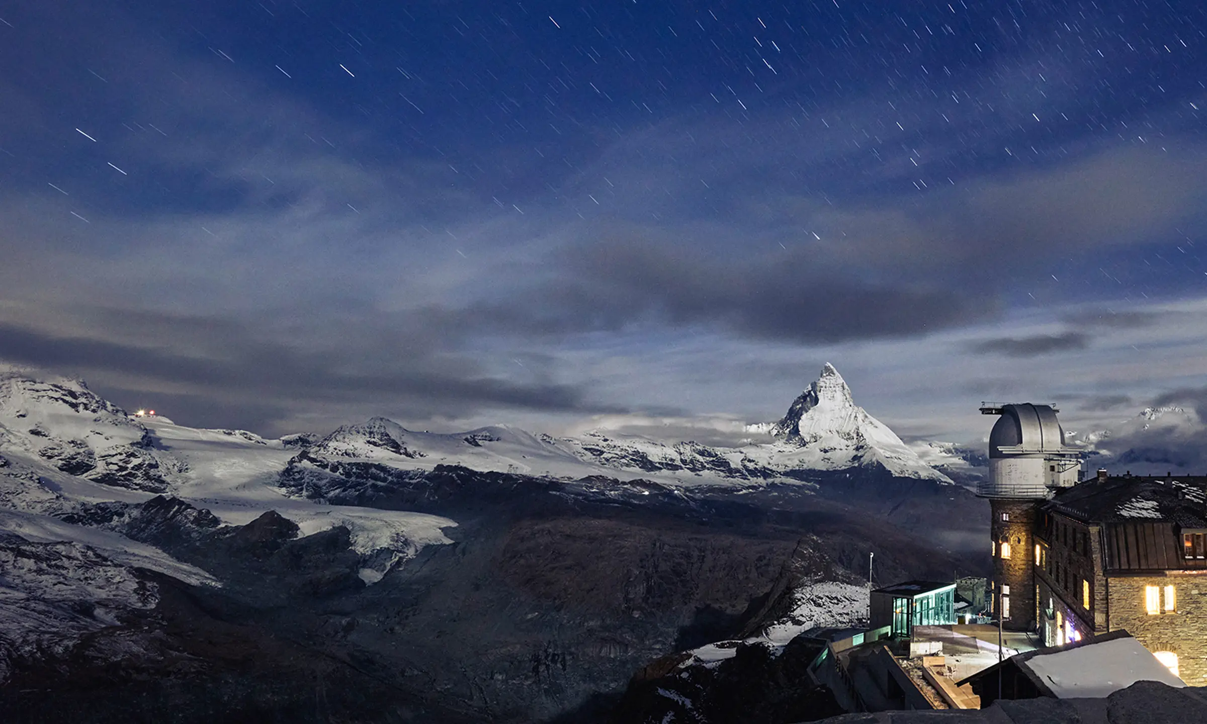 Hotel with observatory and night sky